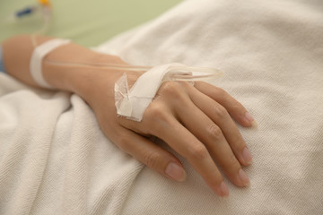 patient with saline in hospital ward
