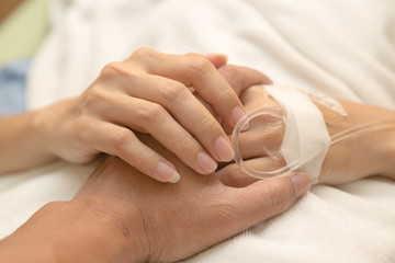 Patient with saline solution in hospital