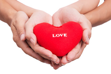 Hand hold red valentine heart on white background