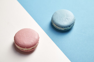 french colorful macarons on colorful background
