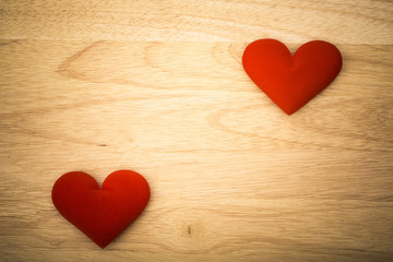 Obraz na płótnie Canvas Valentine day background, red love heart on wooden background