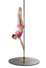 Pole dance. Flexible girl posing while exercising