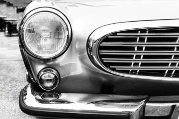 Black and white photo of classic car- vintage film grain filter effect styles
