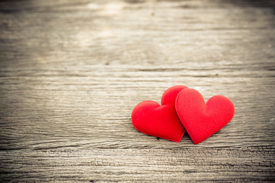 Love valentine heart on wood background