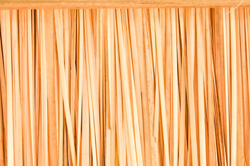 close up artificial thatch texture,dry grass background