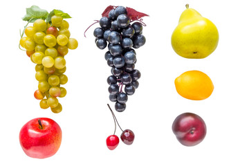 isolated fruits and vegetables made of plastic on a white backgr