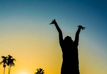 silhouette image of Happy woman in nature.