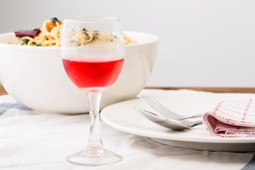 Dinner table with red wine