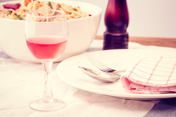 Dinner table with red wine