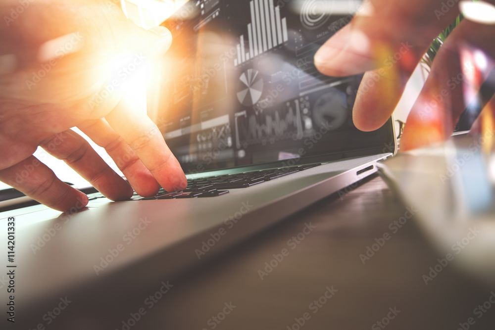 Poster close up of business man hand working on laptop computer with di