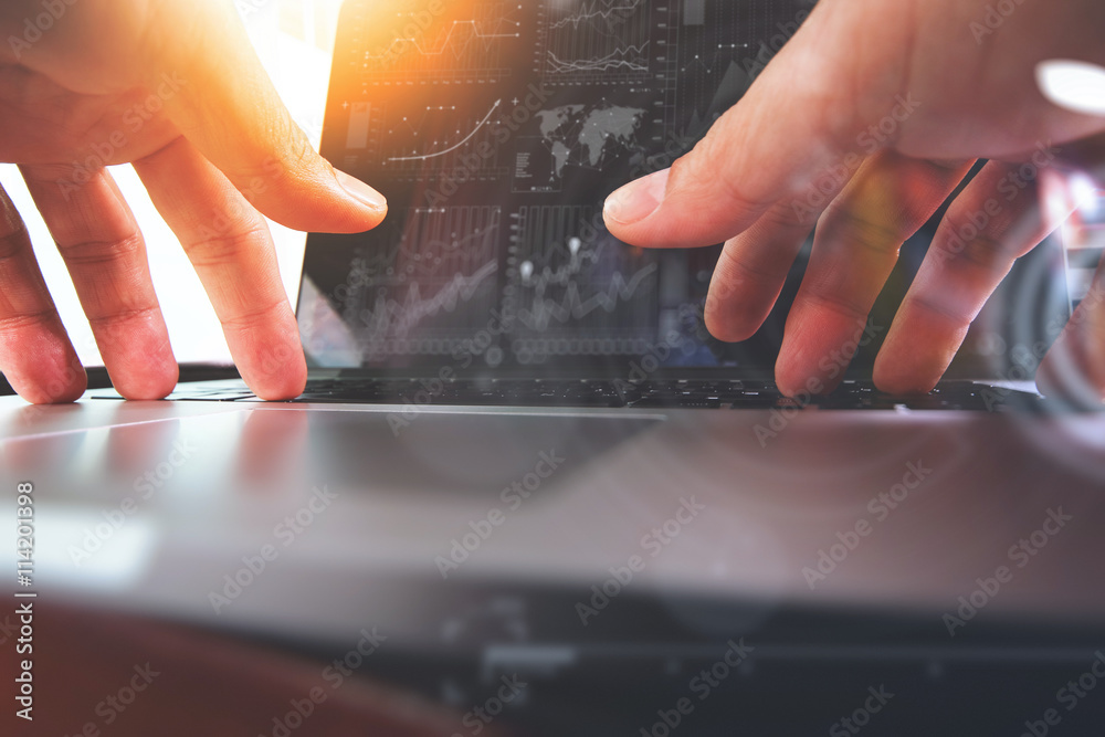 Poster close up of business man hand working on laptop computer with di