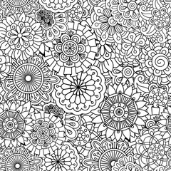 Outlined background design of seamless ornate textile patterns with floral and pinwheel shapes