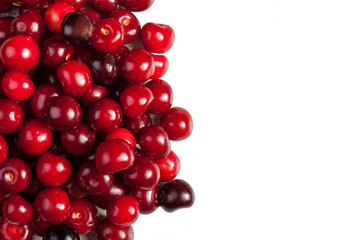Cherries on white wooden table