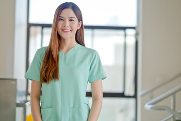 Portrait of friendly female doctor smiling