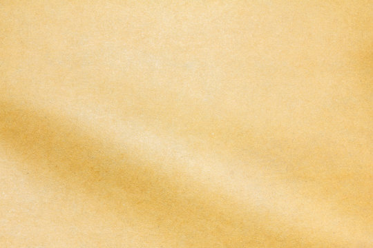 Closeup recycled crumpled brown paper texture. Recycled crumpled brown paper background with copy space for text or image.
