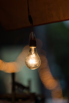 Old light bulb glowing