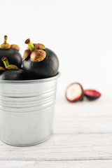 Mangosteen in the zinc bucket