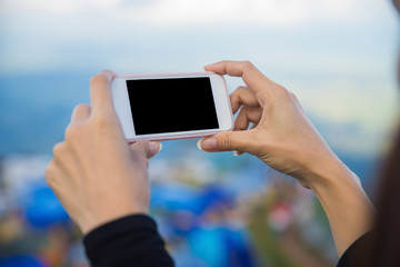 Hand use smartphone taking photo