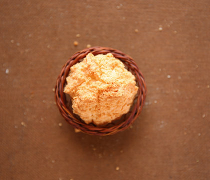 Coconut Cookies with wooden basket on wooden background