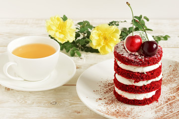 red cake with cherry