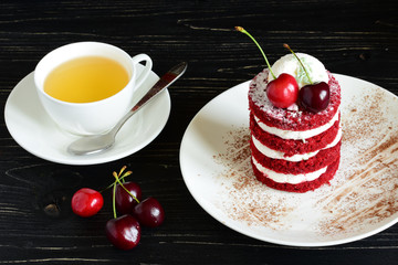 red cake with cherry