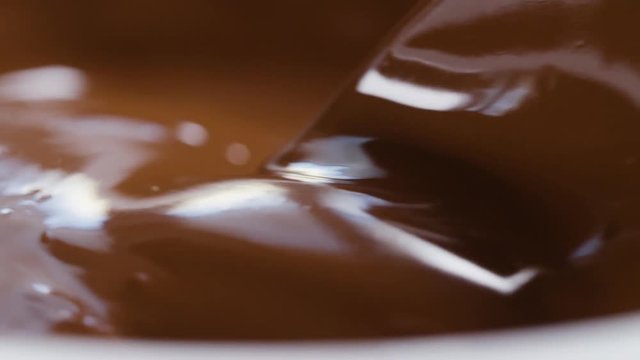 slow motion stiring chocolate background