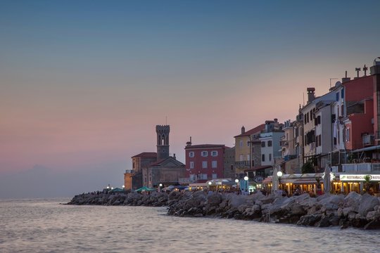 Sunset over coastal city