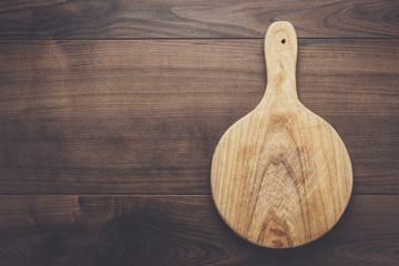 used cutting board on the wooden table