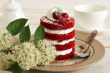 red cake with cherry