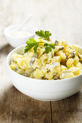 Potato salad with olives and cucumber