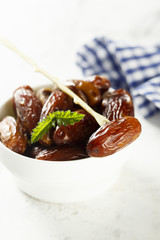 Dates in white bowl
