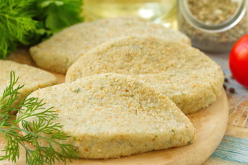 Raw fish cutletes prepared for cook