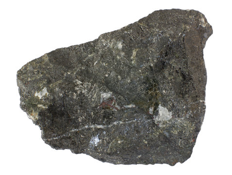 Mineral magnetite isolated on white background. Magnetite is the most magnetic of all the naturally-occurring minerals on Earth. Naturally-magnetized pieces of magnetite, called lodestone. 