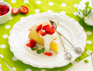 Cheese (curd pudding) with strawberry.