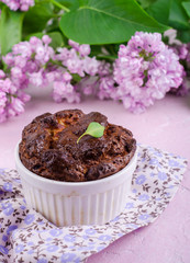 Homemade chocolate cheese souffle on pink background