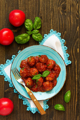 Homemade meatballs in tomato sauce.