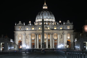 Rome, Vatican &ndash; summer 2016. St.  Peter's Basilica at night with barriers. The Papal Basilica of St. Peter has installed extra crowd barriers leading to the entrance.
