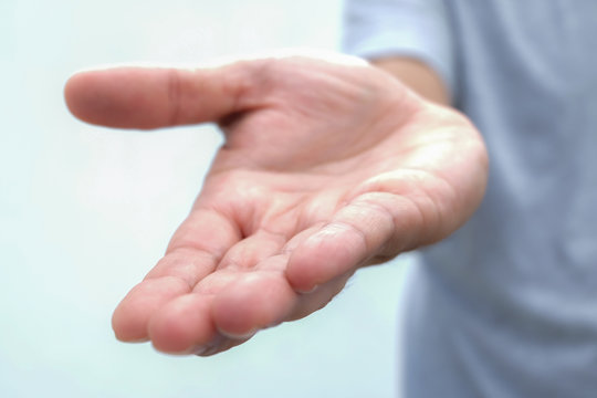 Asking human hand,Open palm hand gesture of male hand