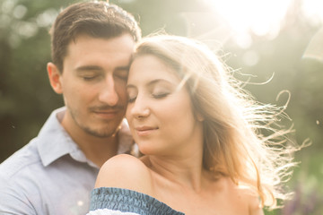 Fototapeta premium loving couple embracing each other in nature