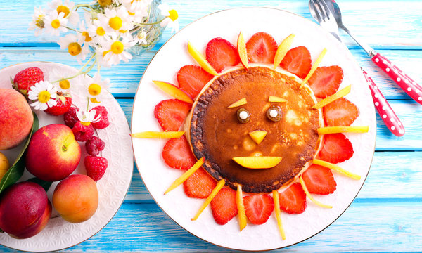 Pancake with strawberry and fruit for kids