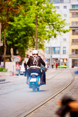 Unidentified biker riding a vintage motorcycle at motorcycle fes