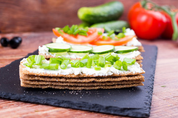 small loafs with cheese and vegetables