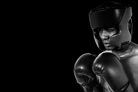 Composite image of boxer performing boxing stance