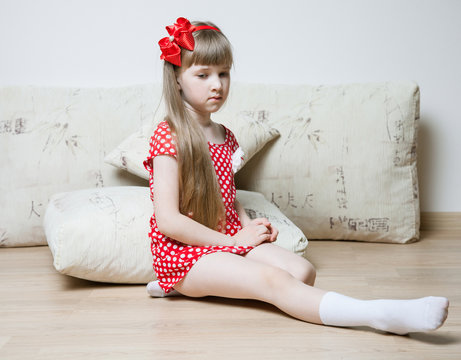Portrait of a thoughtful little girl