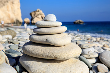 Fototapeta na wymiar Abstract balanced stones on sea