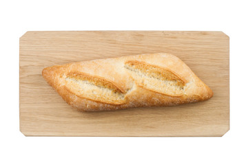 White small bread on wooden board