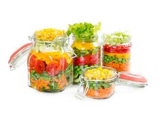 Fototapeta na wymiar Prepared for canning colorful vegetables in glass jars
