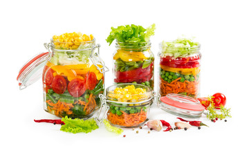Fototapeta na wymiar Prepared for canning colorful vegetables in glass jars
