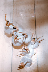 The seven ballerinas on floor