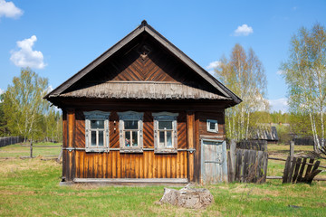Fototapeta na wymiar Old wooden house in a village